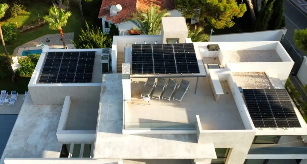Solar panels on a hotel-style building